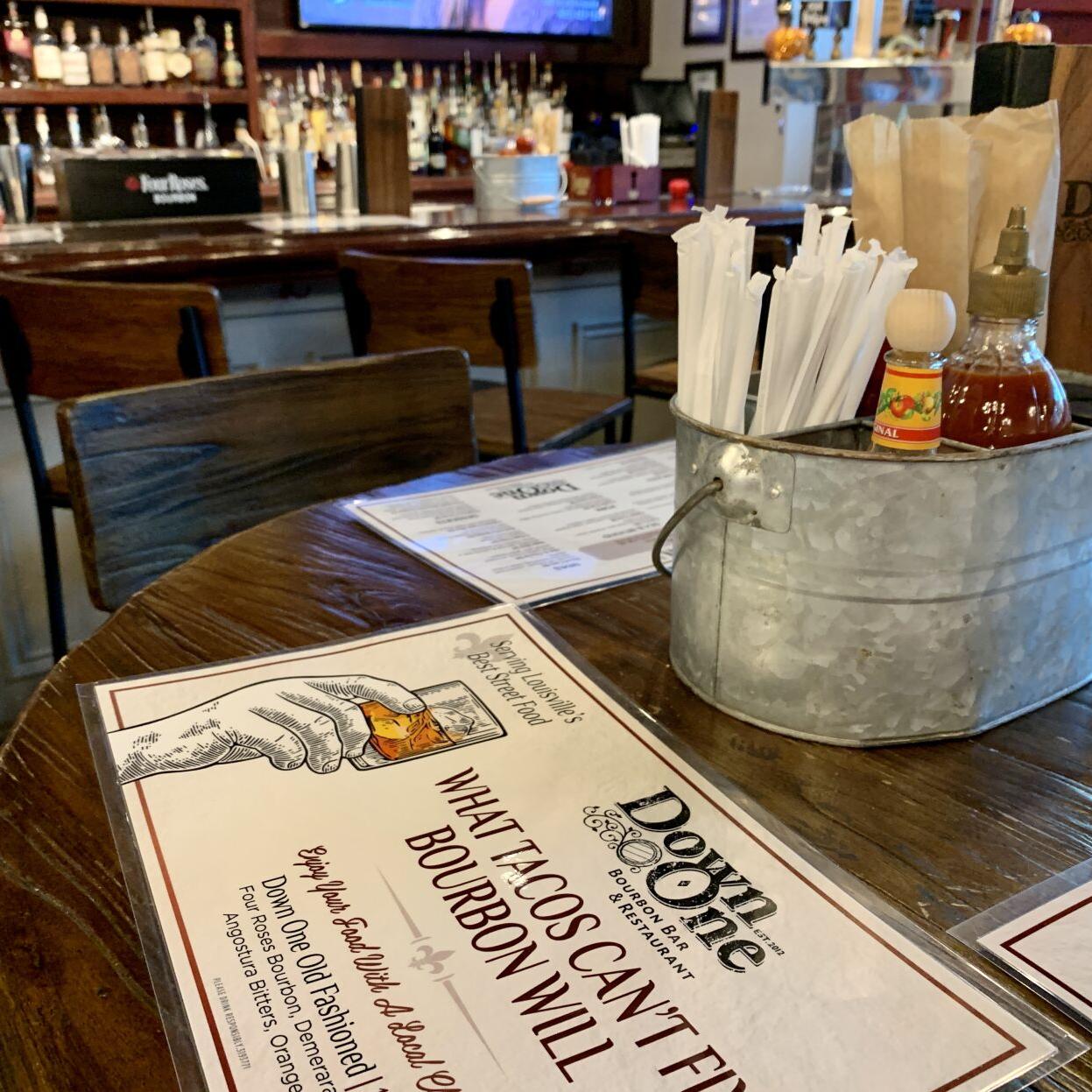 Down One Bourbon Bar menu on table